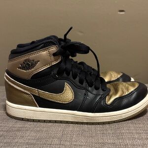 Air Jordan Black and Gold Sneakers